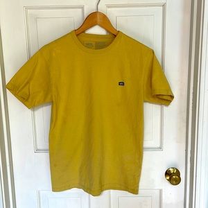 Yellow Van’s tshirt.